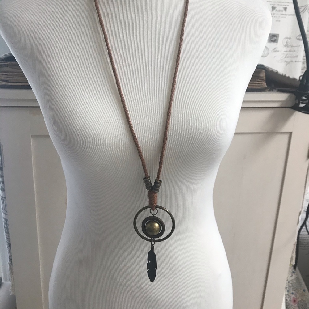 NWOT fashion long necklace with ball and feather